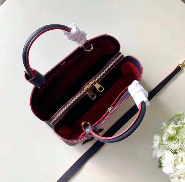 LV Montaigne MM Monogram Empreinte Leather Handle Shoulder Bag with Navy Blue Leather Trim and Shoulder Strap