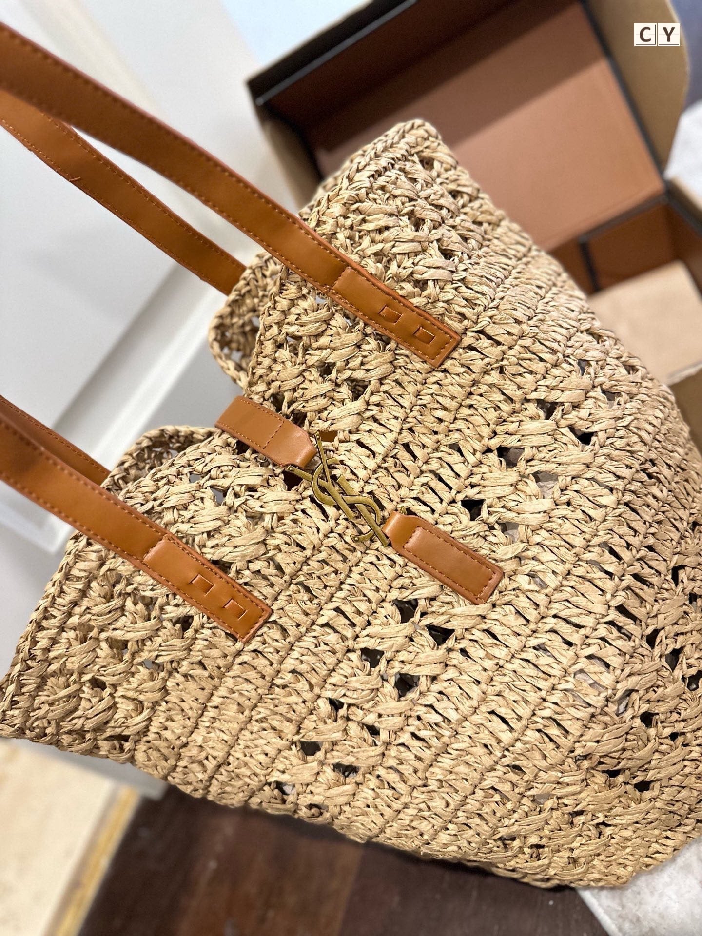 YSL PANIER MEDIUM IN RAFFIA AND VEGETABLE-TANNED LEATHER