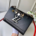 LV Twist MM Epi Leather Handle Crossbody Bag with LV Twist Lock and Love Lock Charms